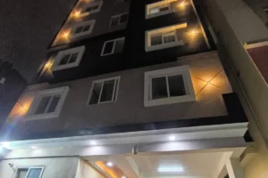 Exterior night view of Co Living PG in Bangalore building.